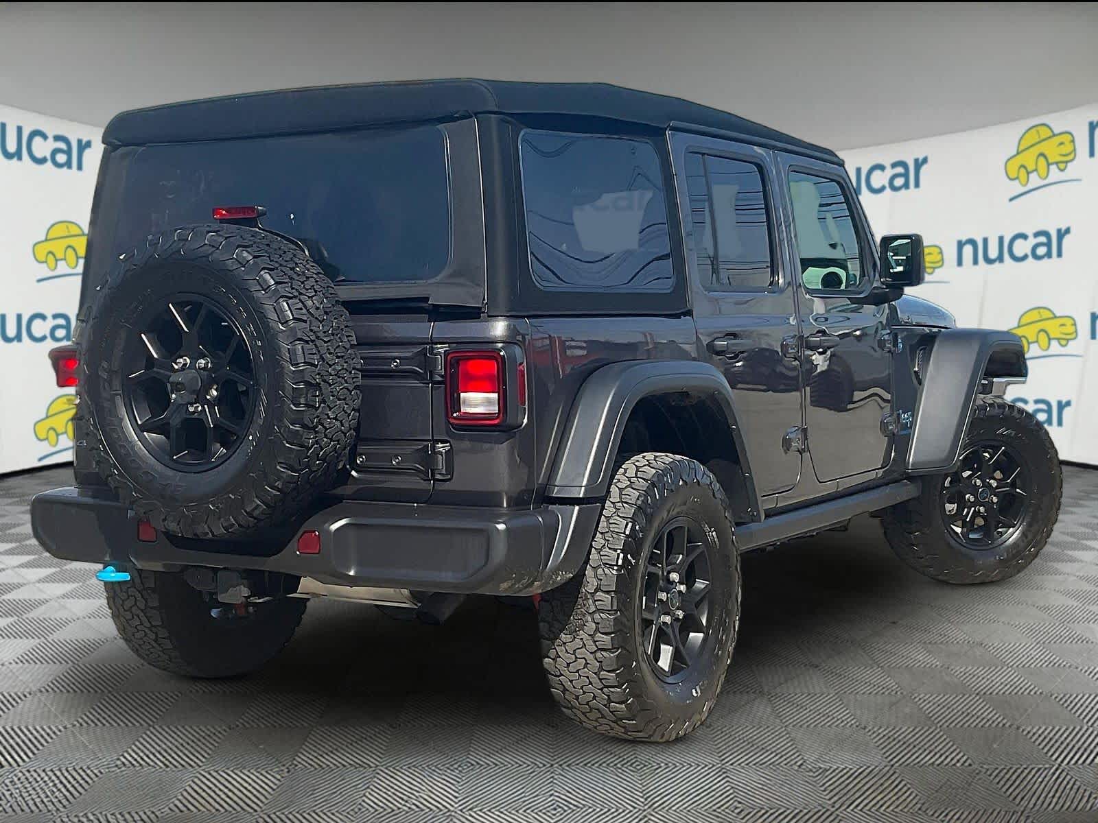 used 2024 Jeep Wrangler 4xe car, priced at $29,557