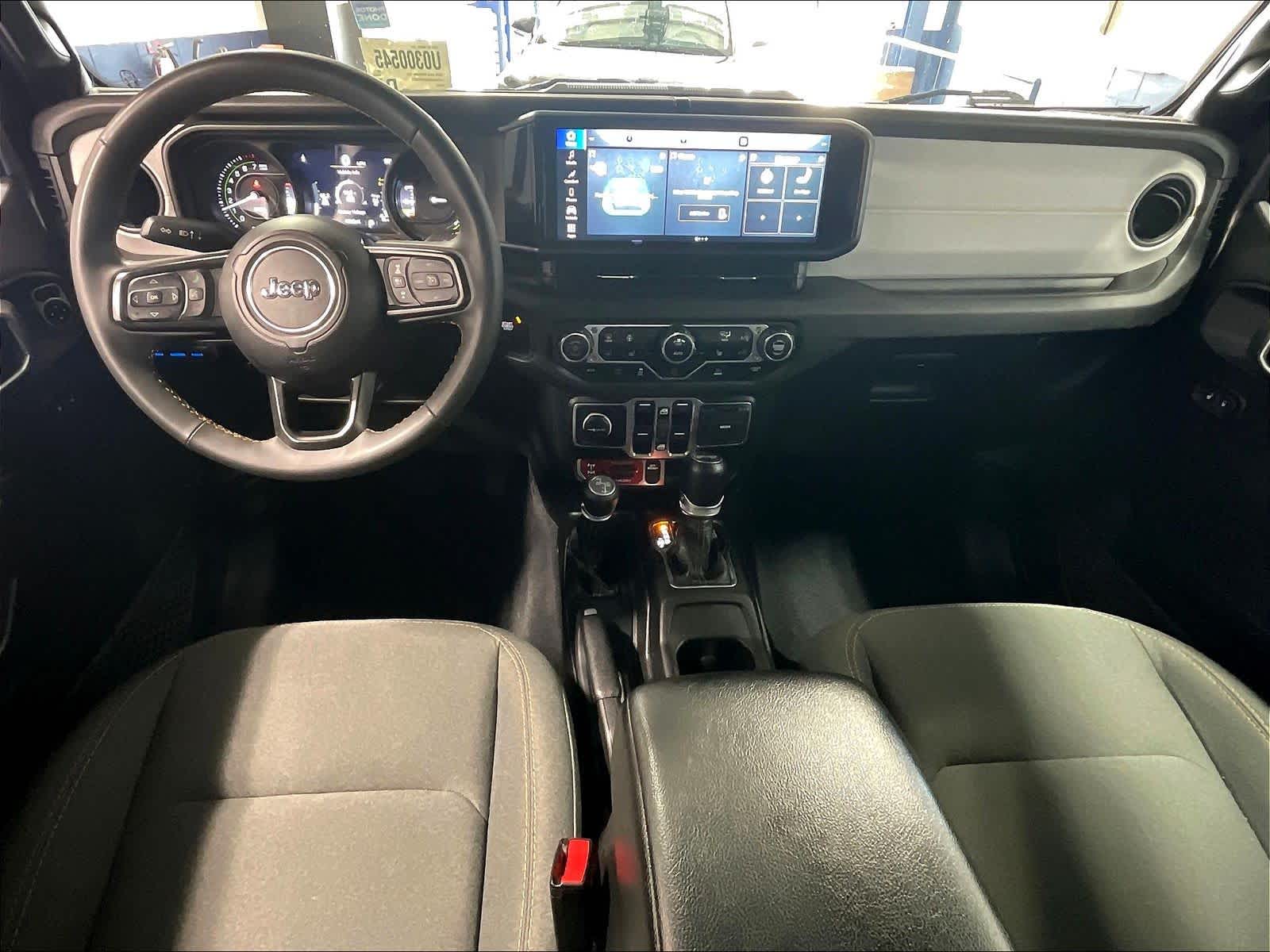 used 2024 Jeep Wrangler 4xe car, priced at $29,557