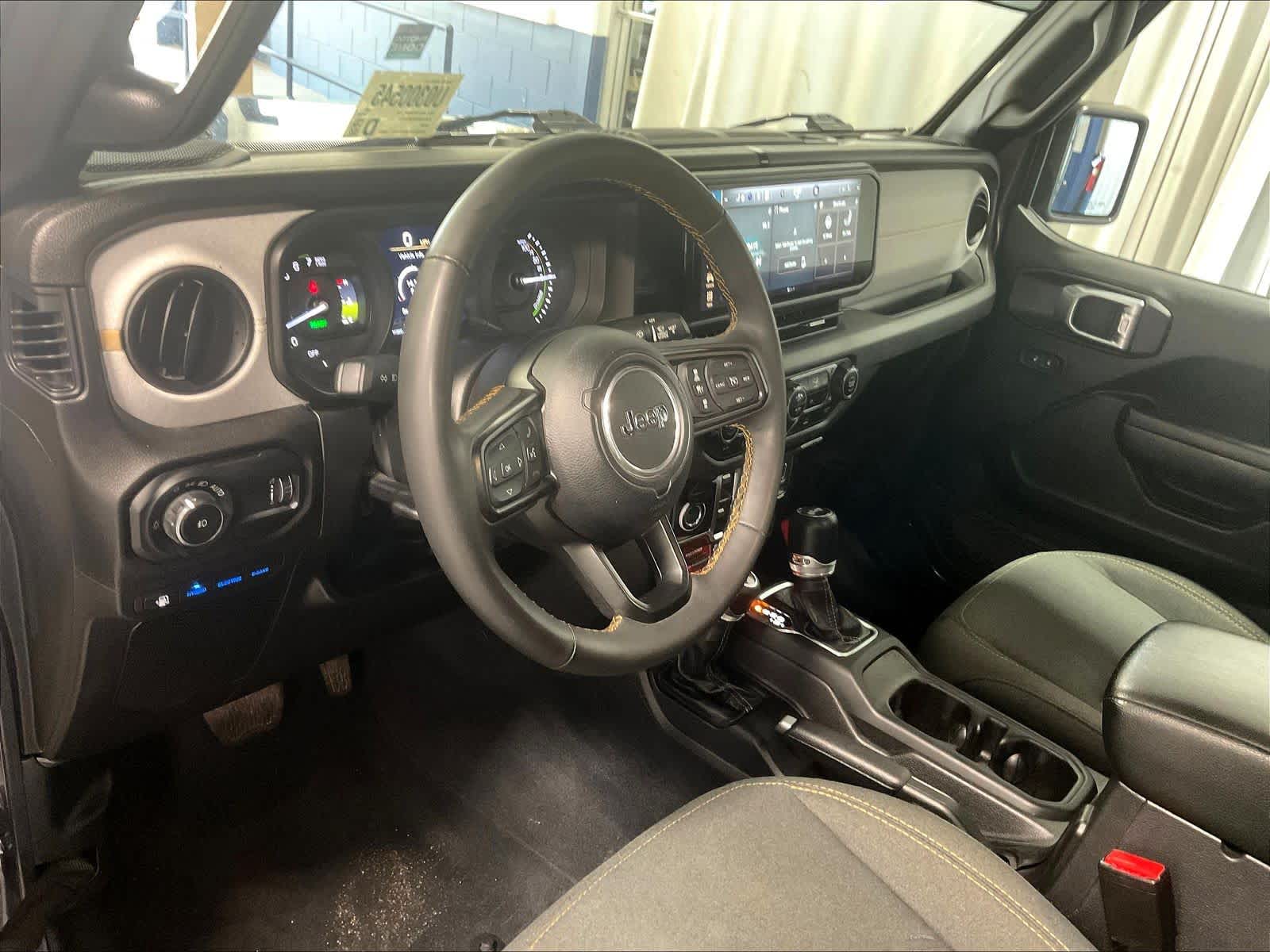 used 2024 Jeep Wrangler 4xe car, priced at $29,557