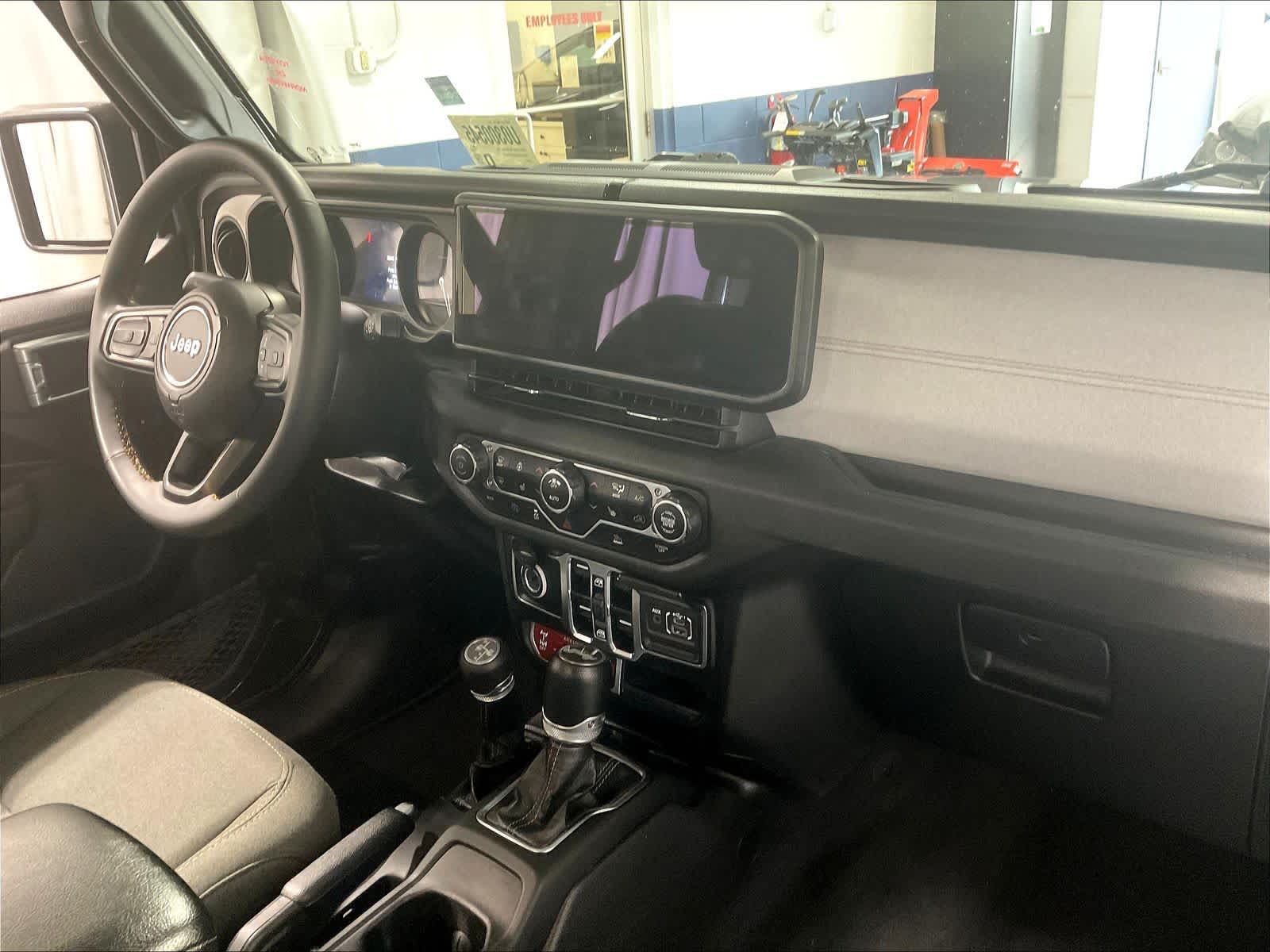 used 2024 Jeep Wrangler 4xe car, priced at $29,557