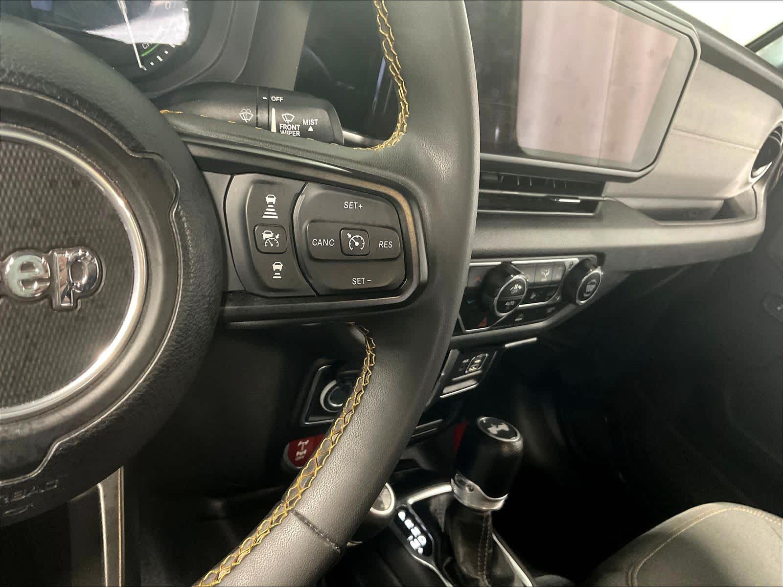 used 2024 Jeep Wrangler 4xe car, priced at $29,557