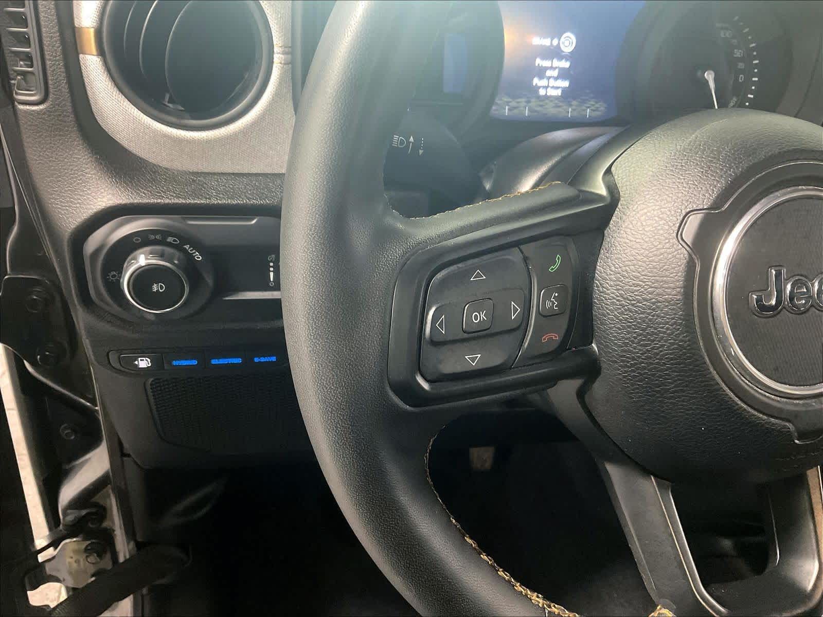 used 2024 Jeep Wrangler 4xe car, priced at $29,557