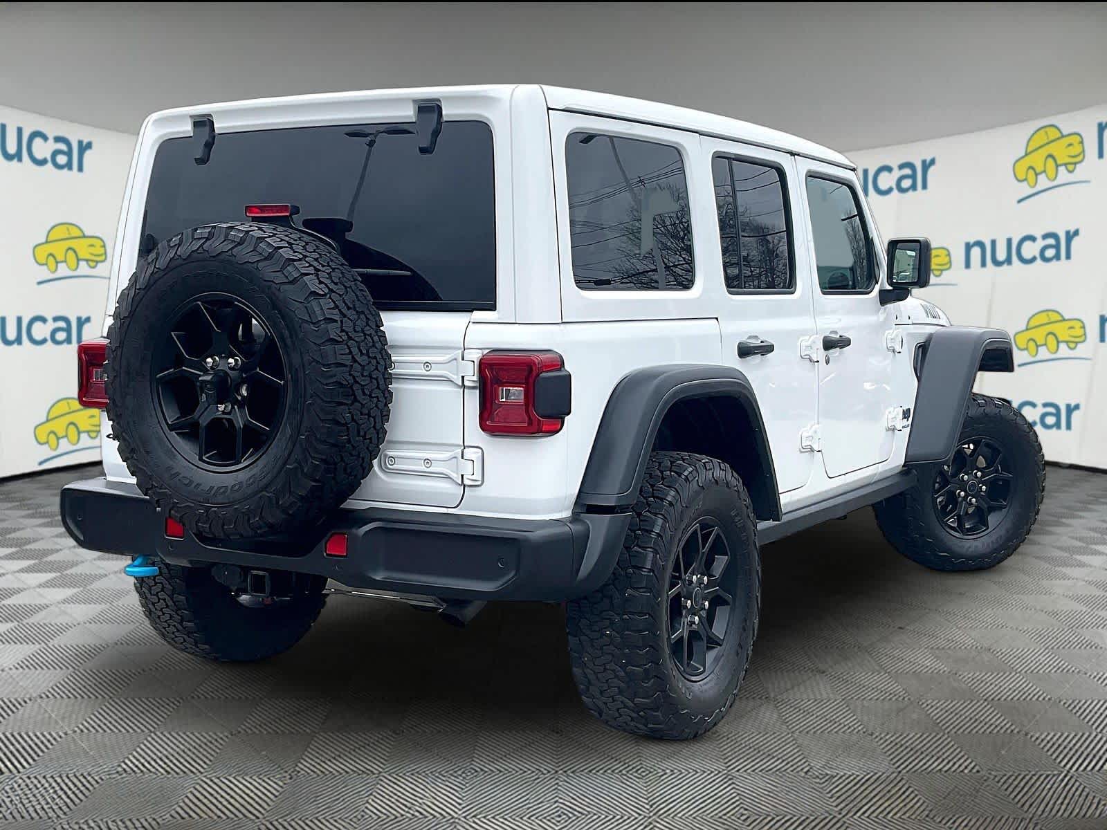 used 2024 Jeep Wrangler 4xe car, priced at $30,302