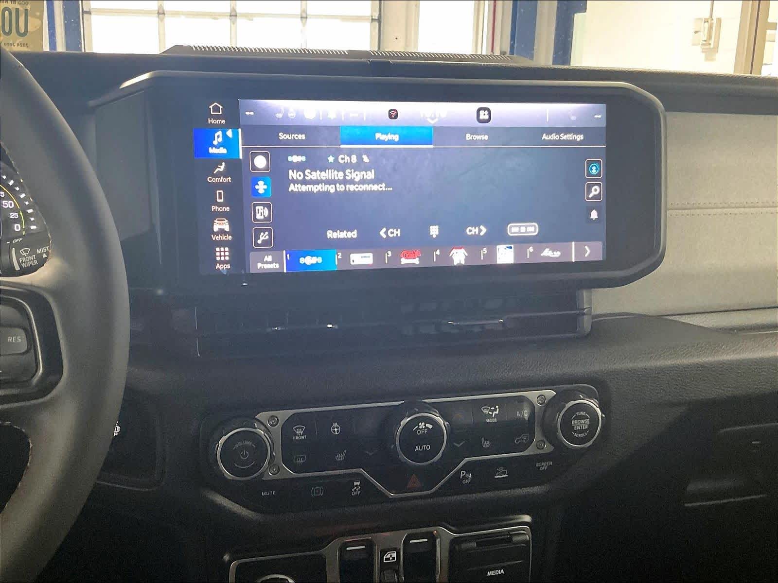 used 2024 Jeep Wrangler 4xe car, priced at $30,302