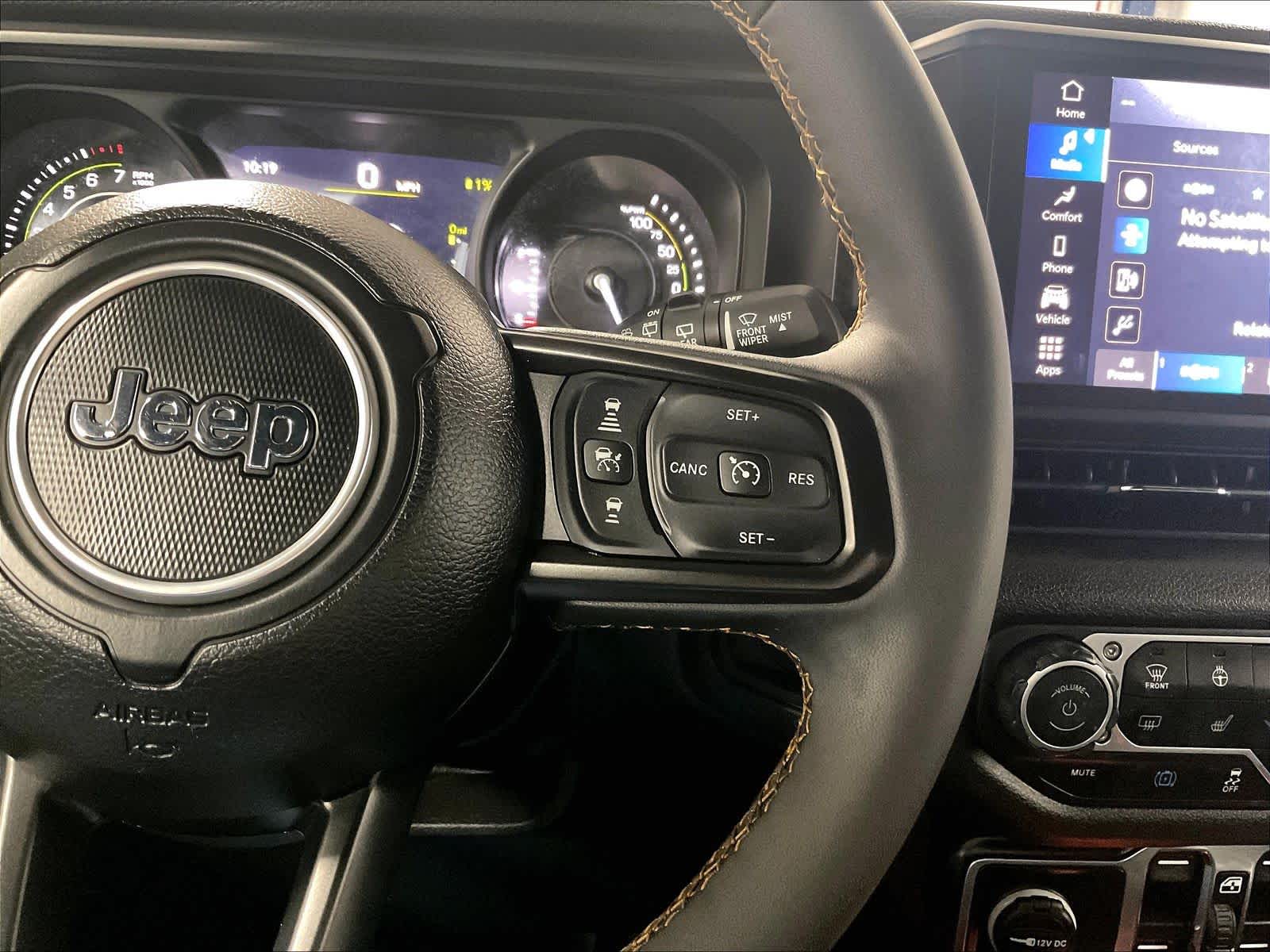 used 2024 Jeep Wrangler 4xe car, priced at $30,302