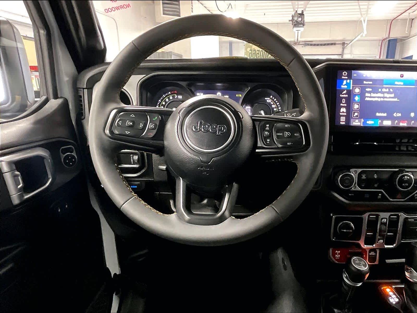 used 2024 Jeep Wrangler 4xe car, priced at $30,302