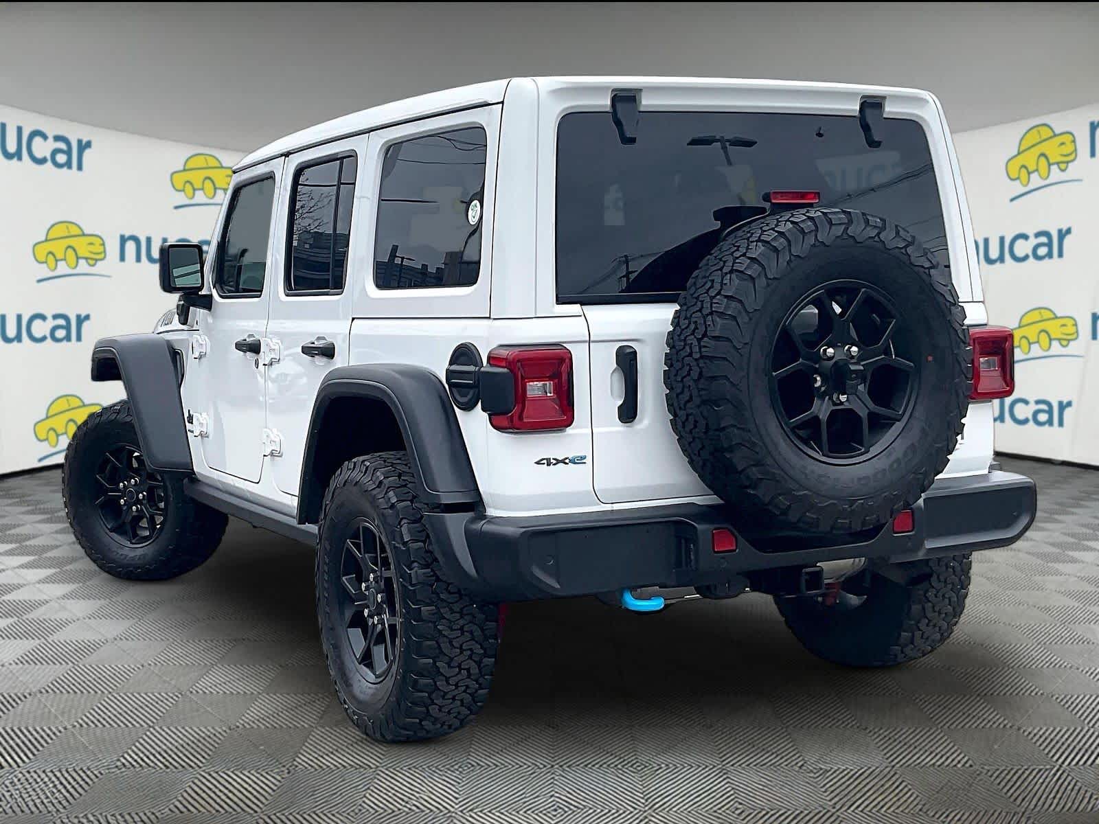 used 2024 Jeep Wrangler 4xe car, priced at $30,302