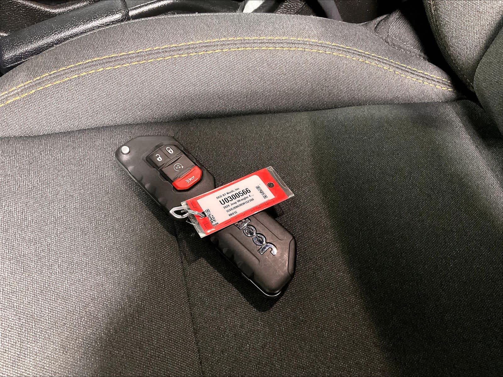 used 2024 Jeep Wrangler 4xe car, priced at $30,302