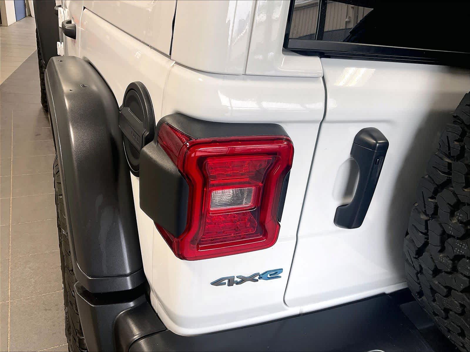 used 2024 Jeep Wrangler 4xe car, priced at $30,302