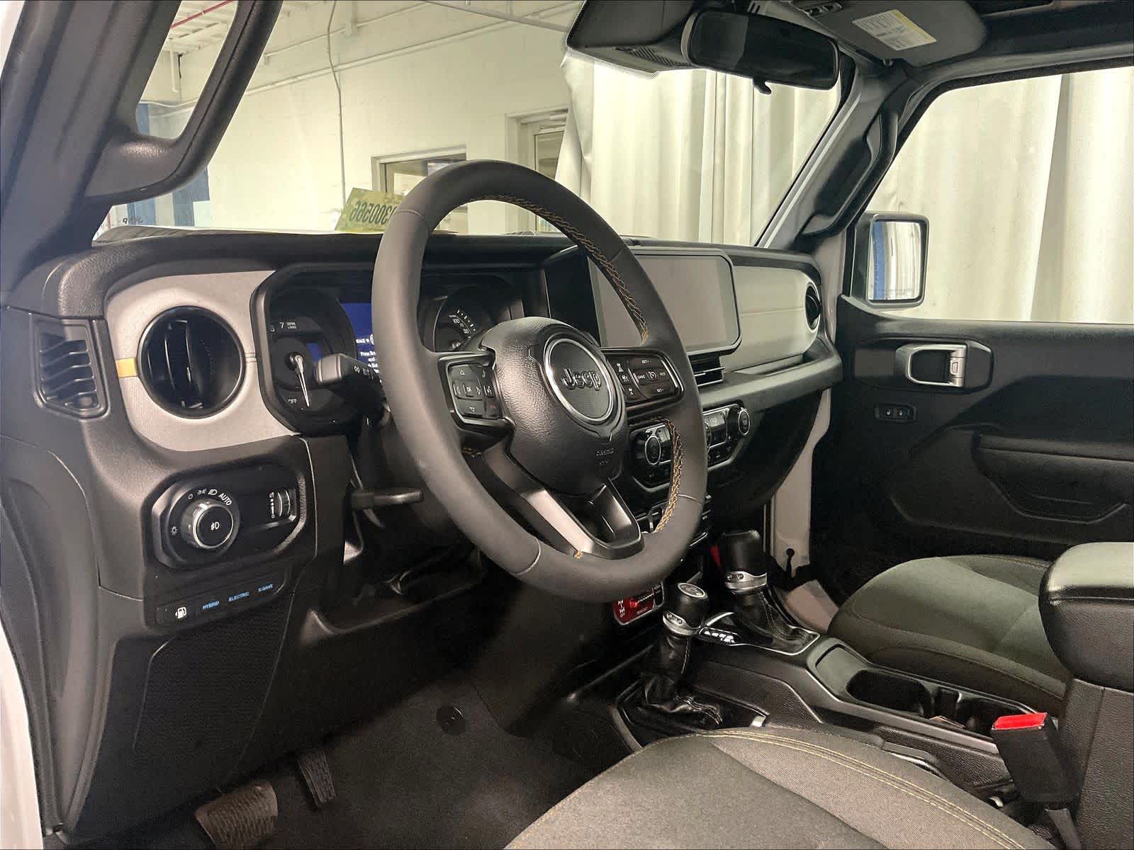 used 2024 Jeep Wrangler 4xe car, priced at $30,302