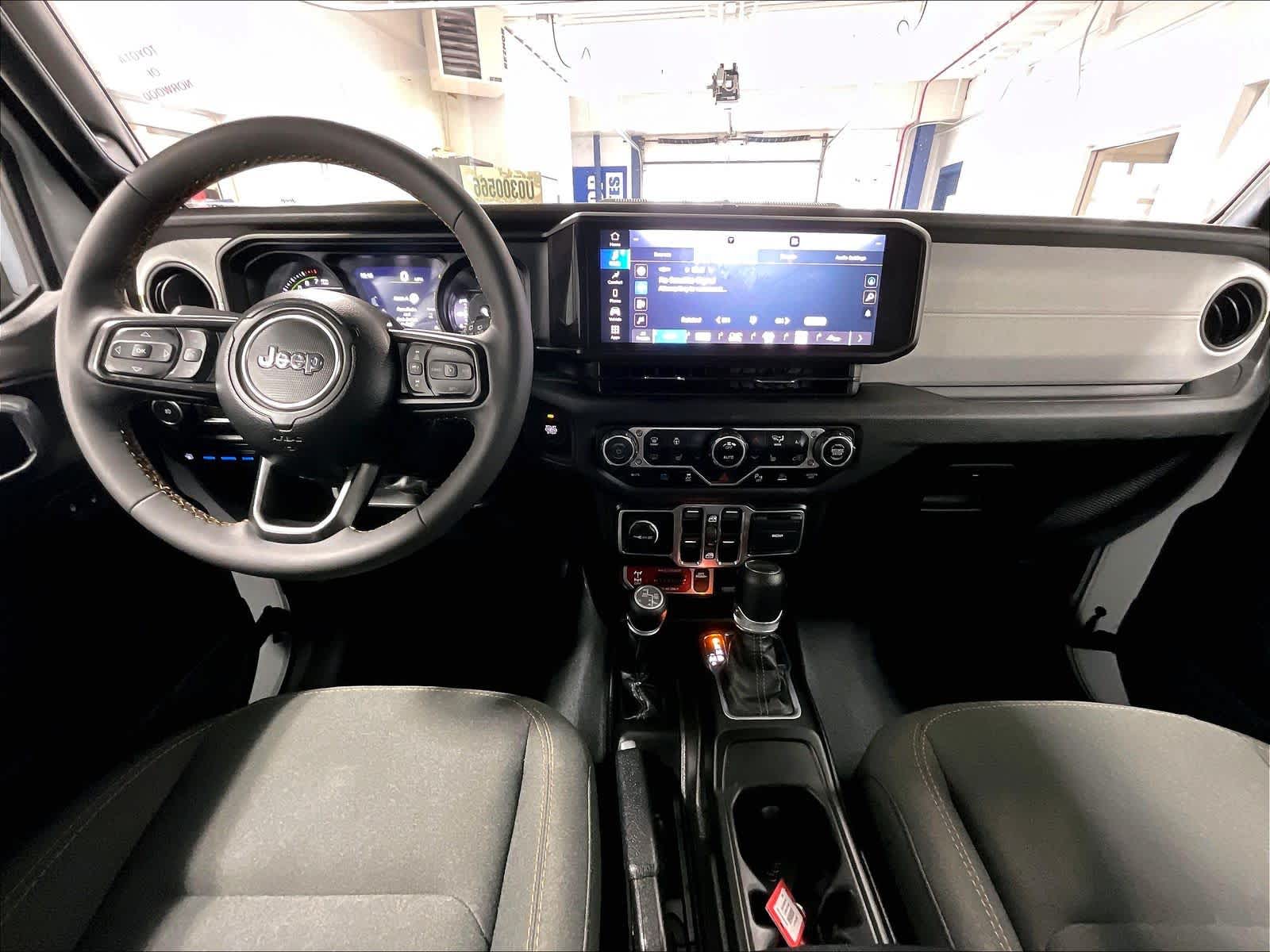 used 2024 Jeep Wrangler 4xe car, priced at $30,302