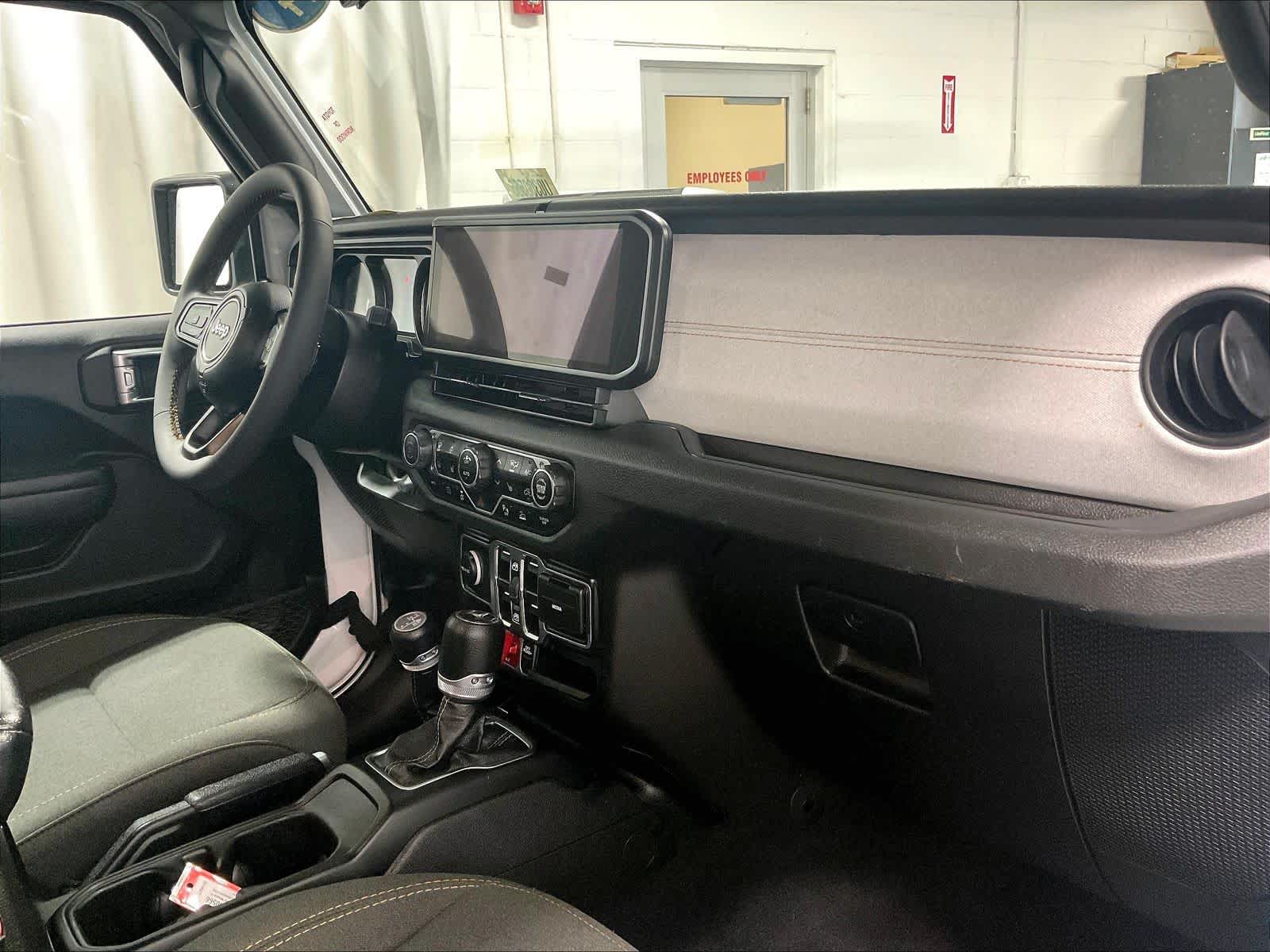 used 2024 Jeep Wrangler 4xe car, priced at $30,302