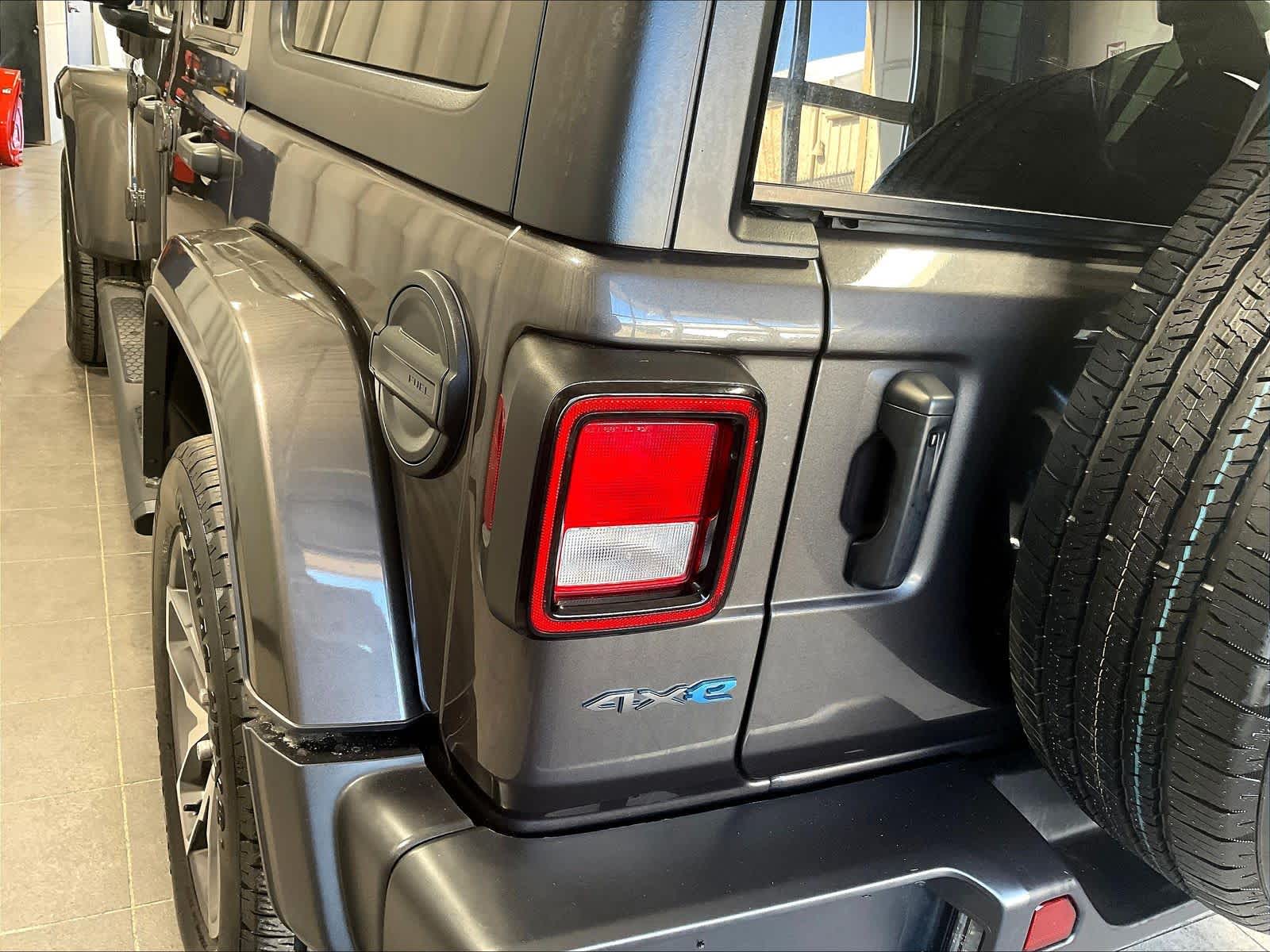 used 2024 Jeep Wrangler 4xe car, priced at $28,997