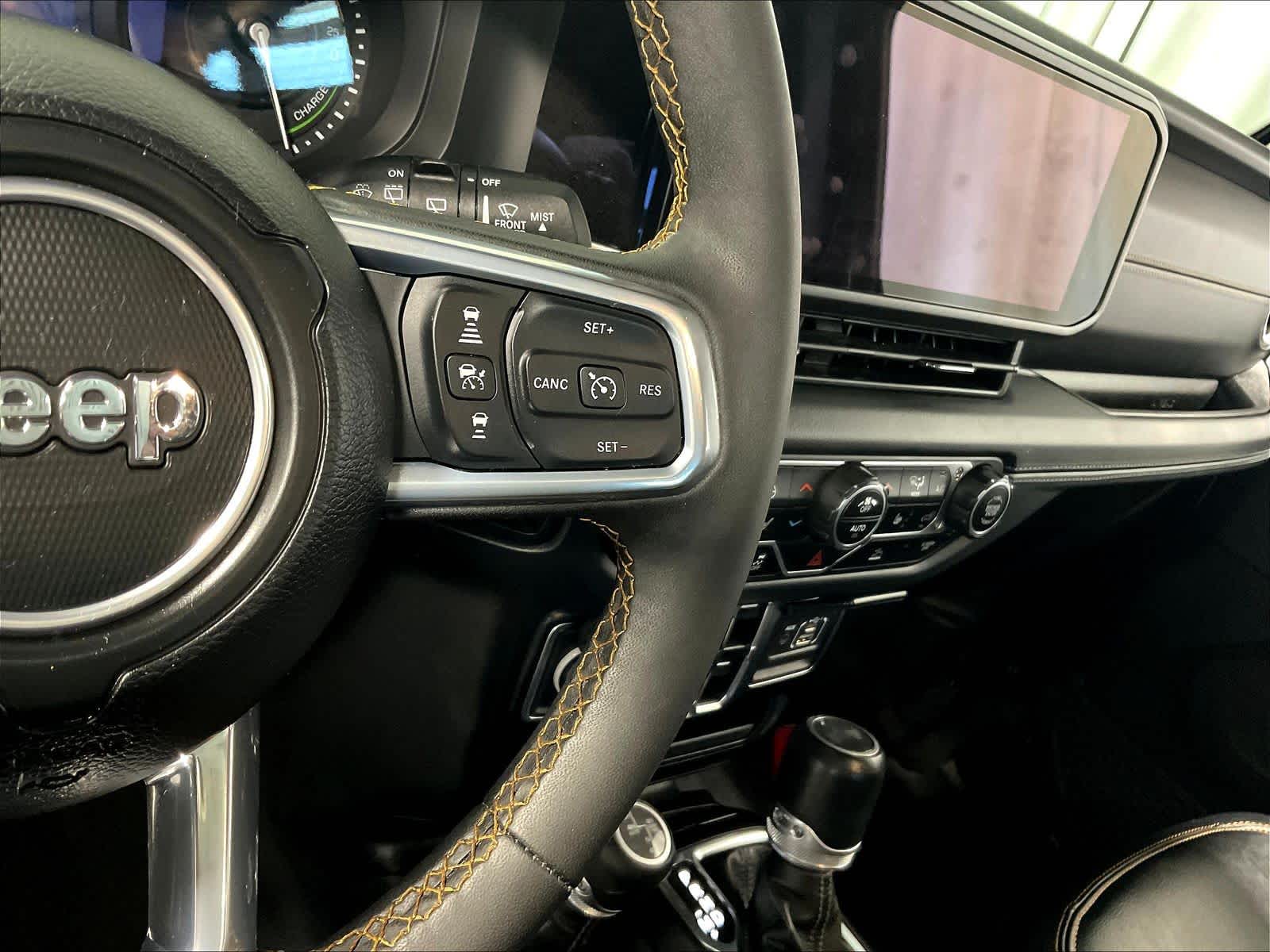 used 2024 Jeep Wrangler 4xe car, priced at $31,499