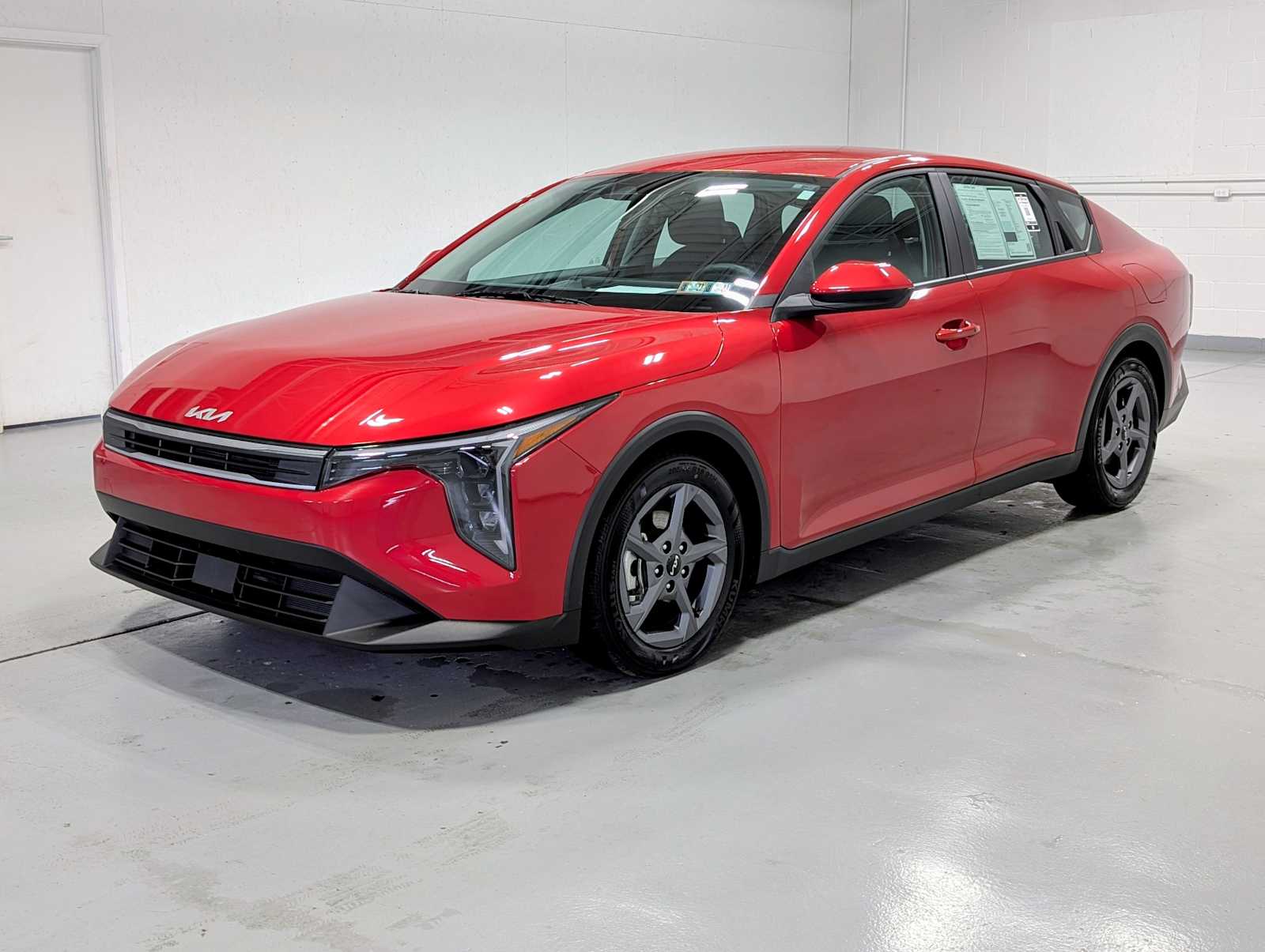 Currant Red 2025 Kia K4 LXS FWD Sedan Front-Wheel Drive Continuously Variable Transmission