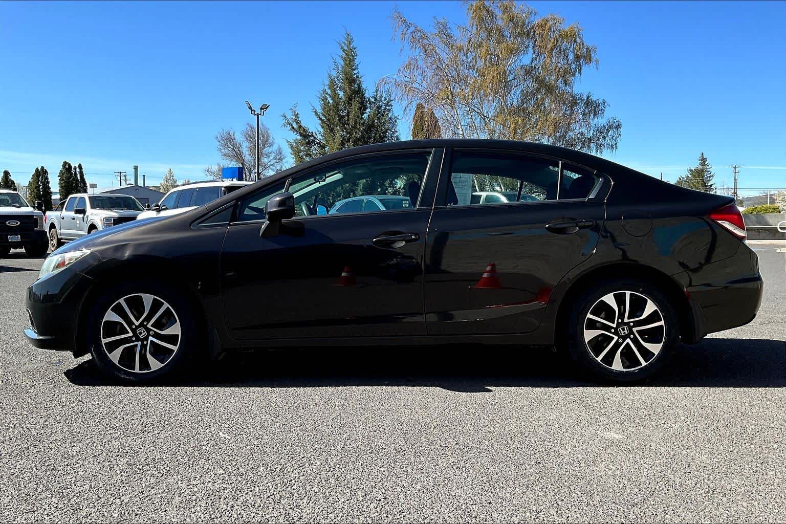 View vehicle photo 3