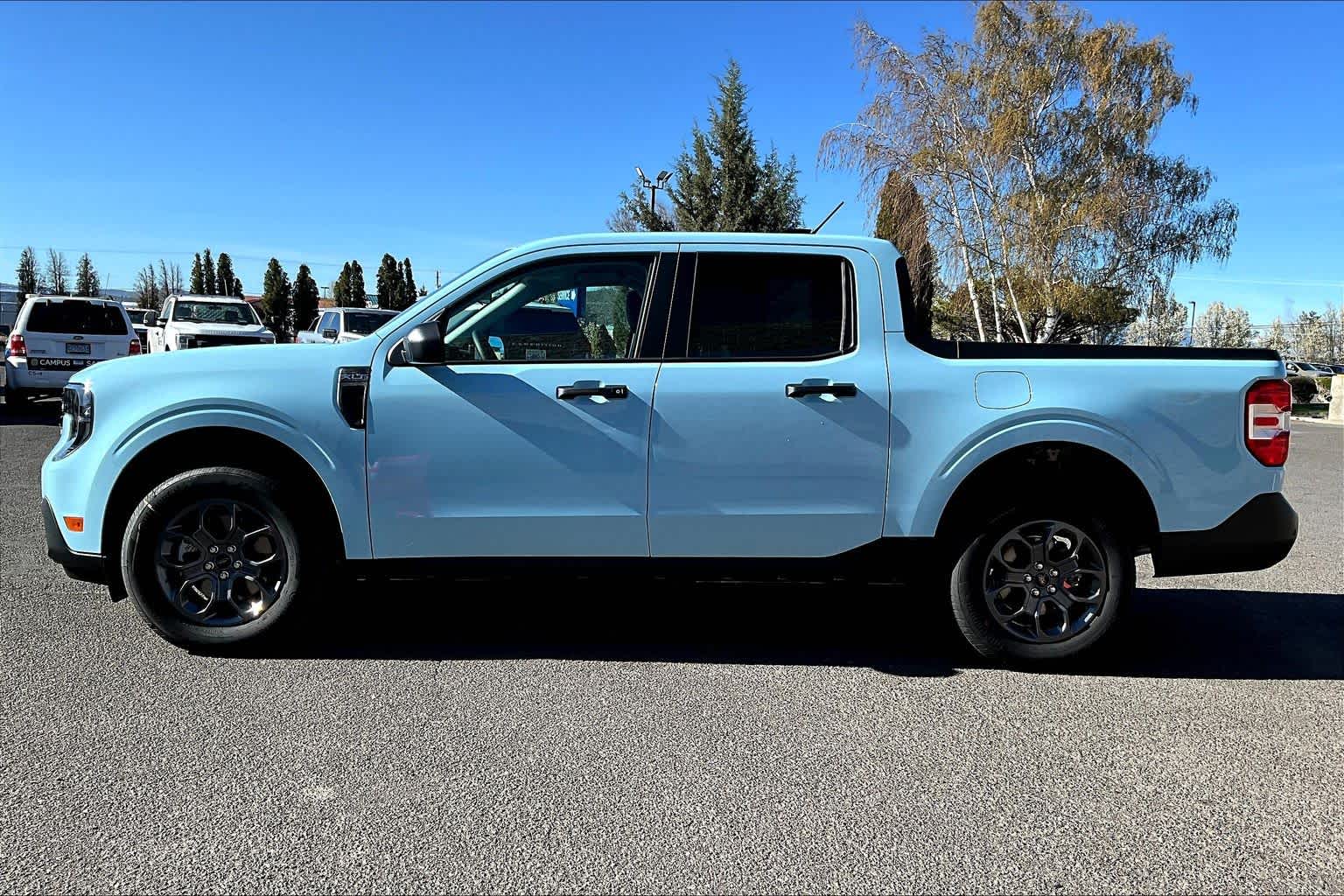 View vehicle photo 3