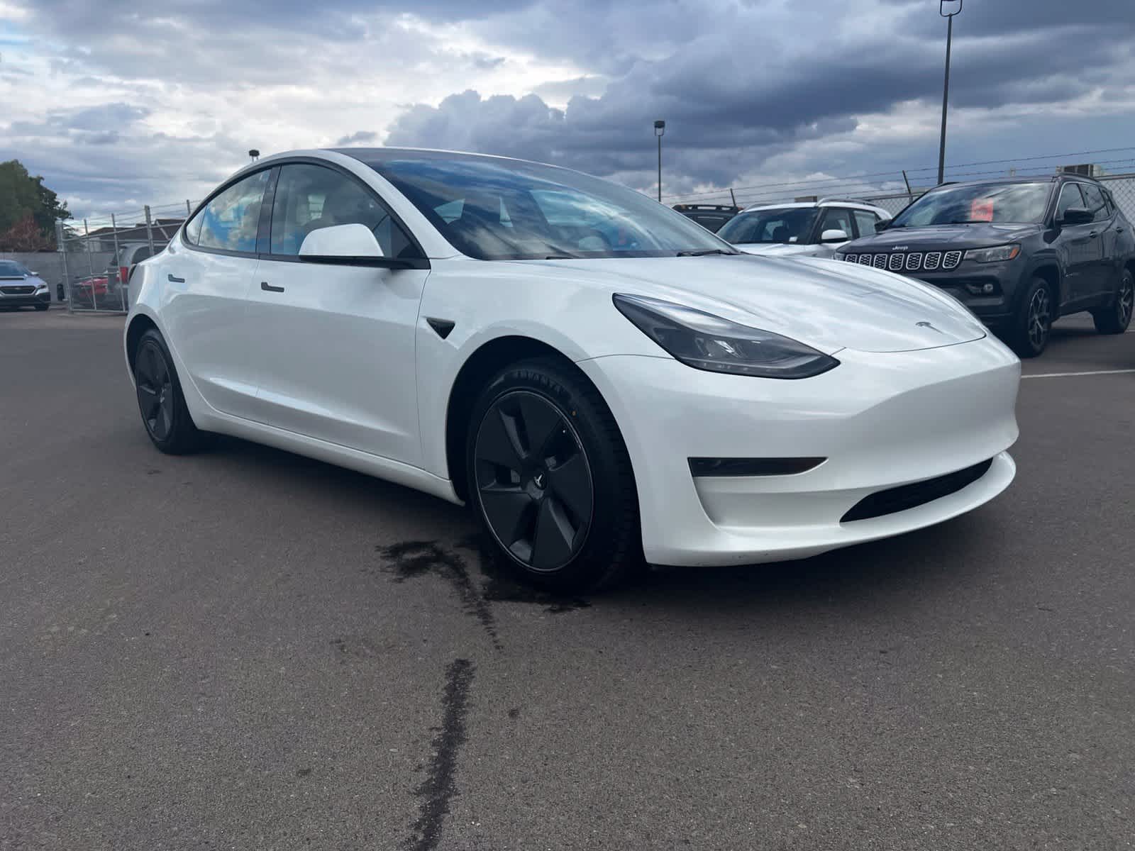 Used 2023 Tesla Model 3 Base with VIN 5YJ3E1EA8PF585119 for sale in Fresno, CA