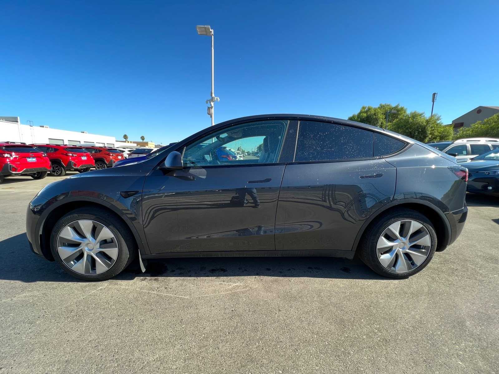 Used 2024 Tesla Model Y Long Range with VIN 7SAYGAEE2RF987128 for sale in Fresno, CA
