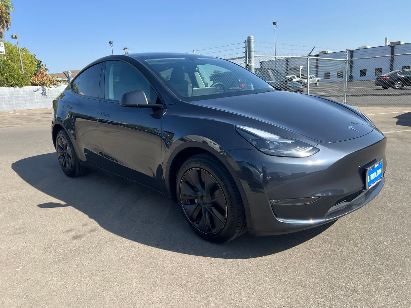 Used 2025 Tesla Model Y Long Range with VIN 7SAYGDEE5SF296151 for sale in Fresno, CA