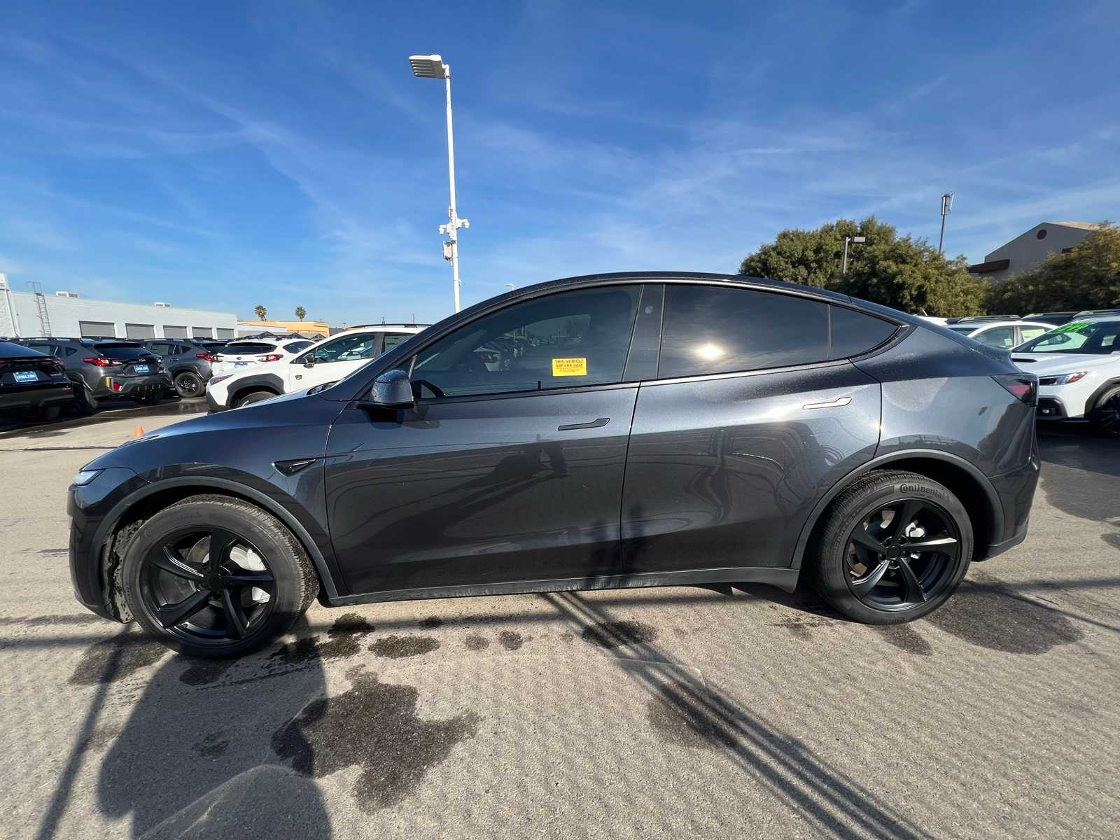 Used 2026 Tesla Model Y Premium with VIN 7SAYGDEE8TF344615 for sale in Northfield, Minnesota