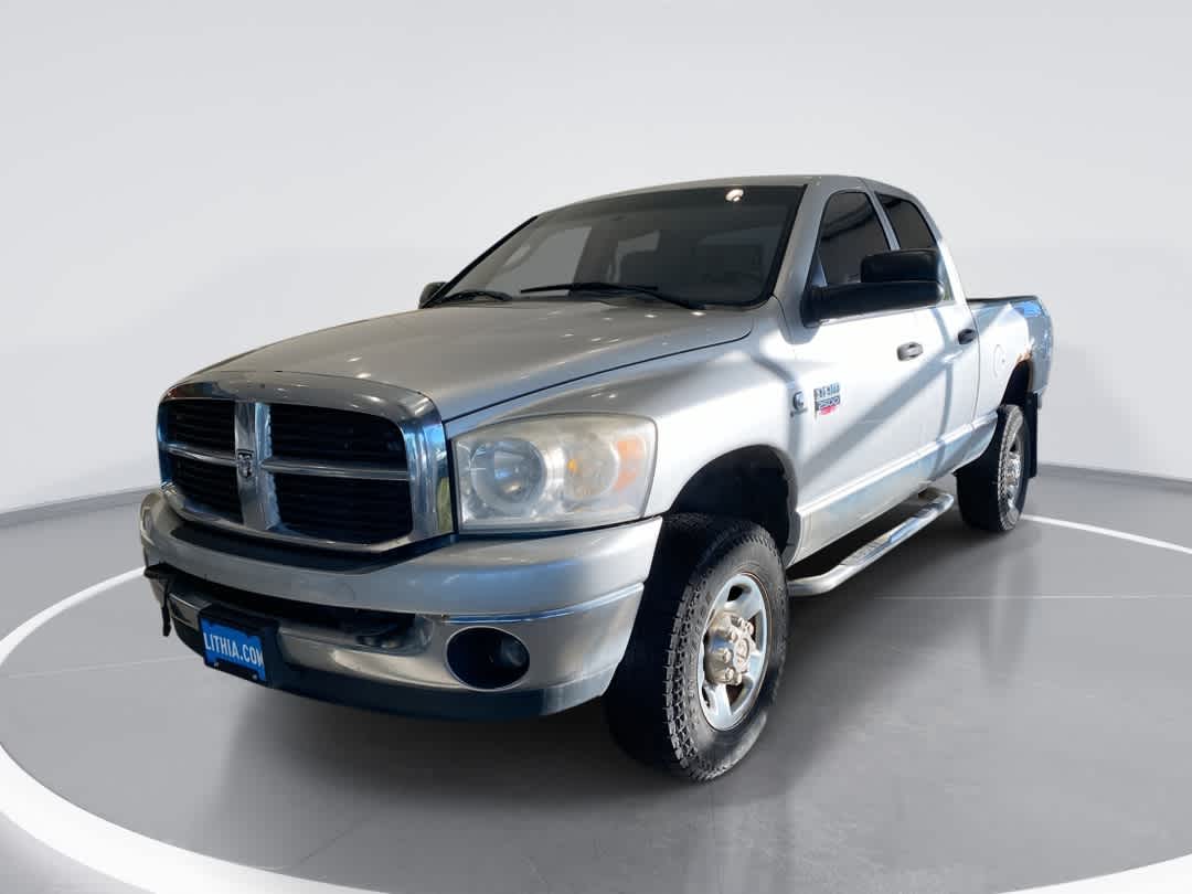 Bright Silver Metallic Clear Coat 2007 Dodge RAM 2500 SLT Quad Cab 4WD Pickup Truck Four-Wheel Drive 6-Speed Automatic