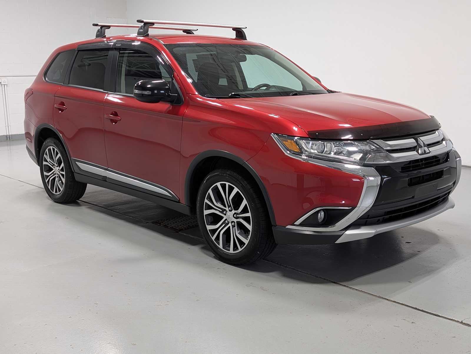 Rally Red Metallic 2017 Mitsubishi Outlander SUV / Crossover All-Wheel Drive Continuously Variable Transmission