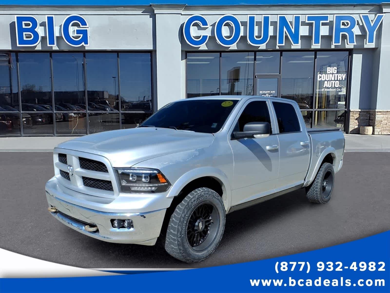 Bright Silver Metallic 2010 Dodge RAM 1500 Pickup Truck Four-Wheel Drive 5-Speed Automatic