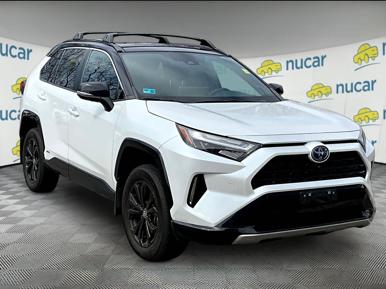 Wind Chill Pearl/Midnight Black Metallic 2023 Toyota RAV4 Hybrid XSE AWD SUV / Crossover All-Wheel Drive Continuously Variable Transmission