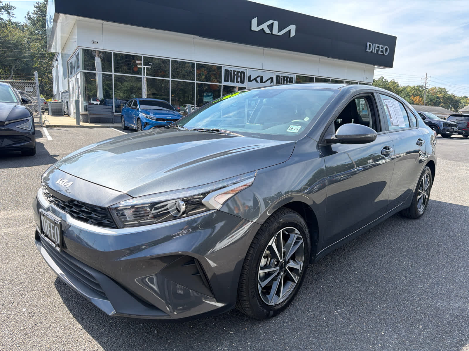 Gravity Gray 2023 Kia Forte Sedan Front-Wheel Drive Continuously Variable Transmission