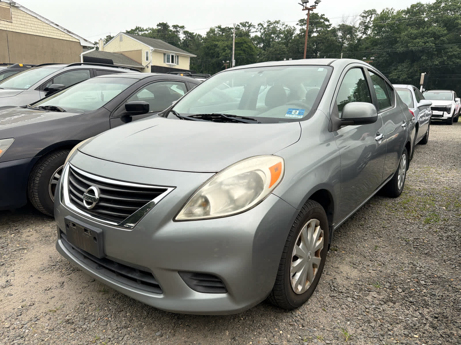 Magnetic Gray Metallic 2012 Nissan Versa Sedan Front-Wheel Drive Continuously Variable Transmission