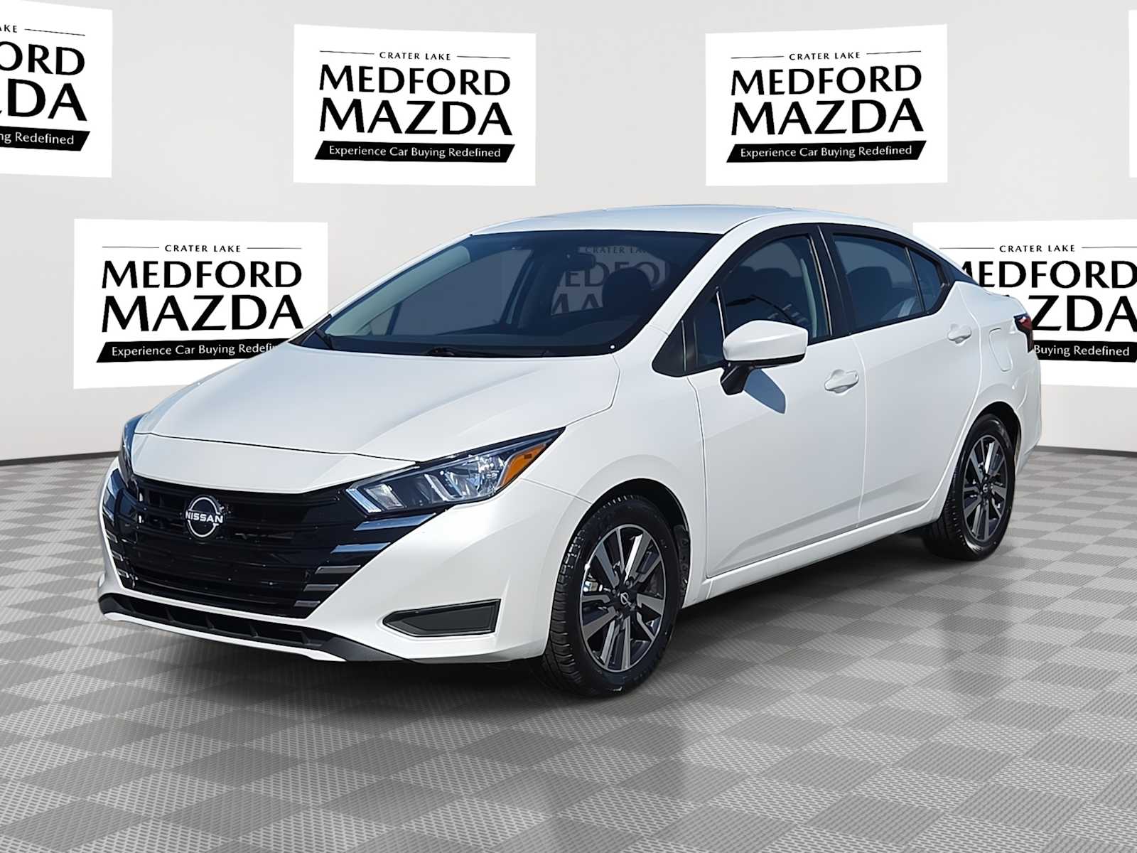 Aspen White Tricoat 2024 Nissan Versa Sedan Front-Wheel Drive Continuously Variable Transmission