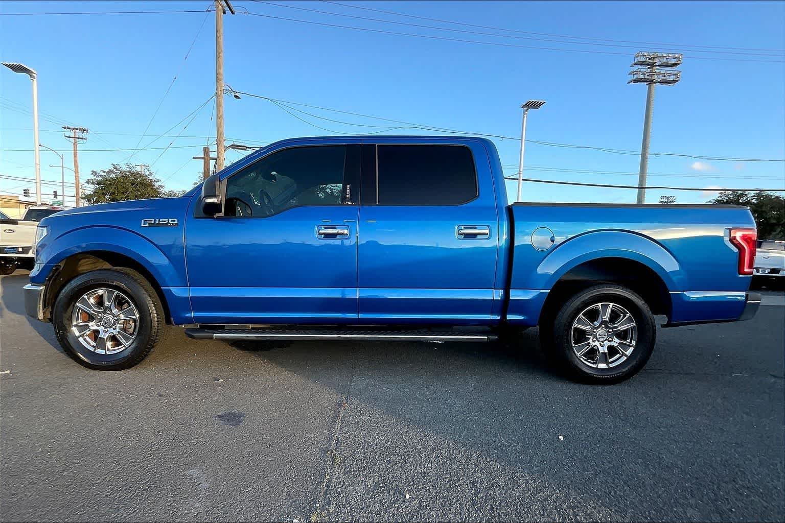 View vehicle photo 3