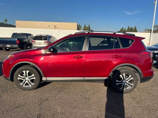 Used 2018 Toyota RAV4 LE with VIN 2T3BFREV7JW822338 for sale in Tustin, CA