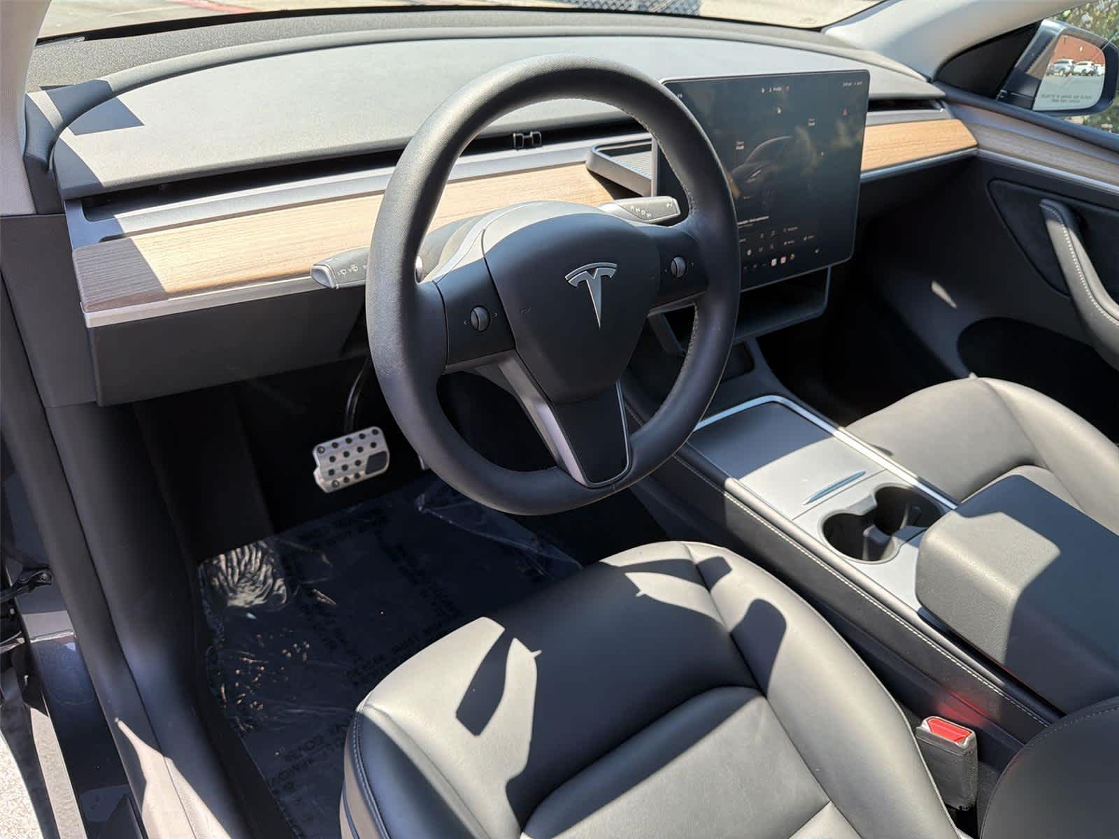 Used 2025 Tesla Model Y Long Range with VIN 7SAYGDEE2SF270445 for sale in Tustin, CA