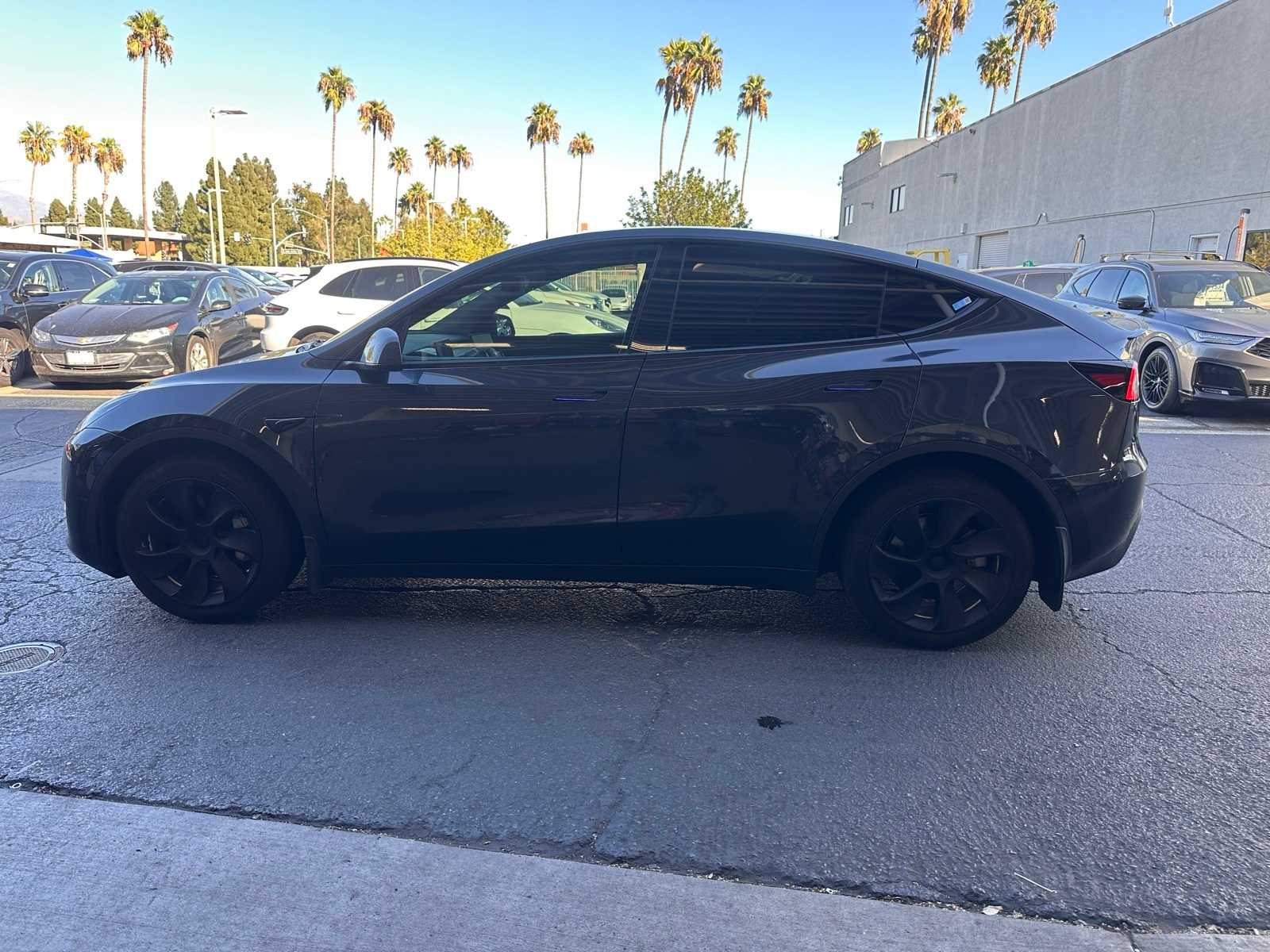Used 2024 Tesla Model Y Long Range with VIN 7SAYGDEE9RF006441 for sale in Tustin, CA