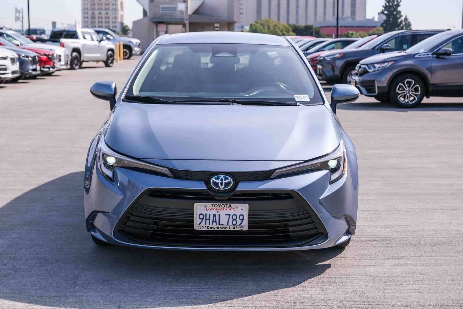 Certified 2023 Toyota Corolla LE with VIN JTDBCMFE0PJ011322 for sale in Northfield, Minnesota