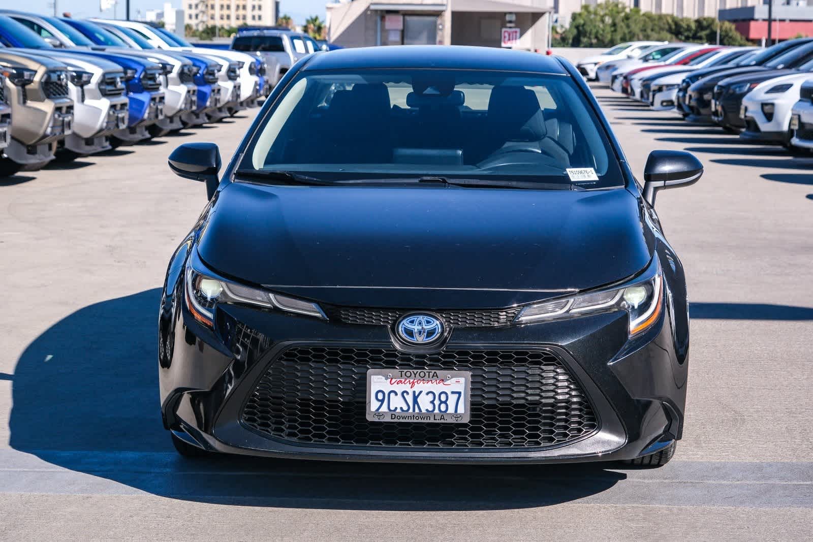 Certified 2022 Toyota Corolla LE with VIN JTDEAMDE2NJ061190 for sale in Northfield, Minnesota