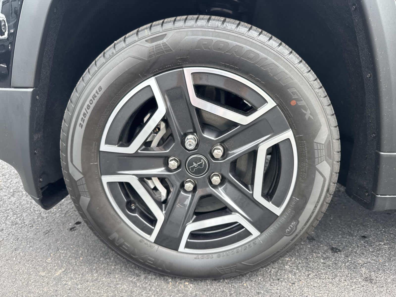 View vehicle photo 3