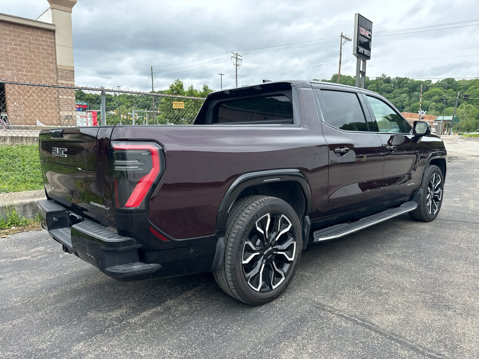 2025 GMC Sierra EV Extended Range Denali Dark Ember Tintcoat at Baglier Buick GMC Mazda