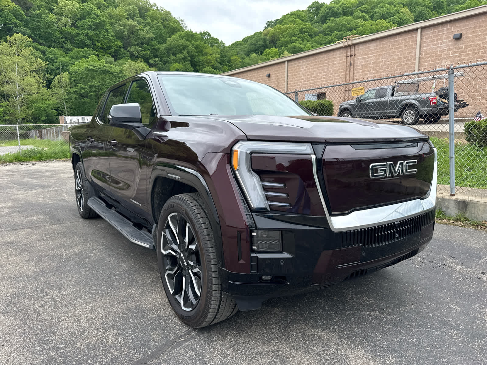 2025 GMC Sierra EV Extended Range Denali Dark Ember Tintcoat at Baglier Buick GMC Mazda