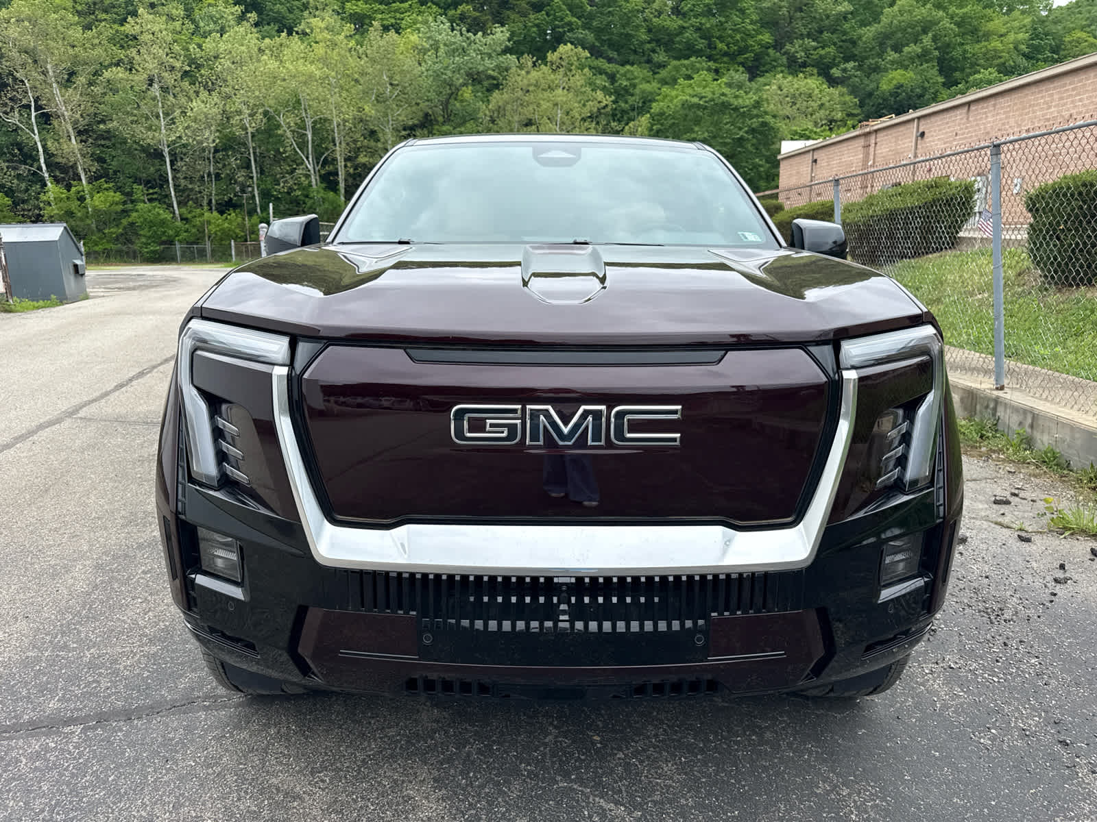 2025 GMC Sierra EV Extended Range Denali Dark Ember Tintcoat at Baglier Buick GMC Mazda