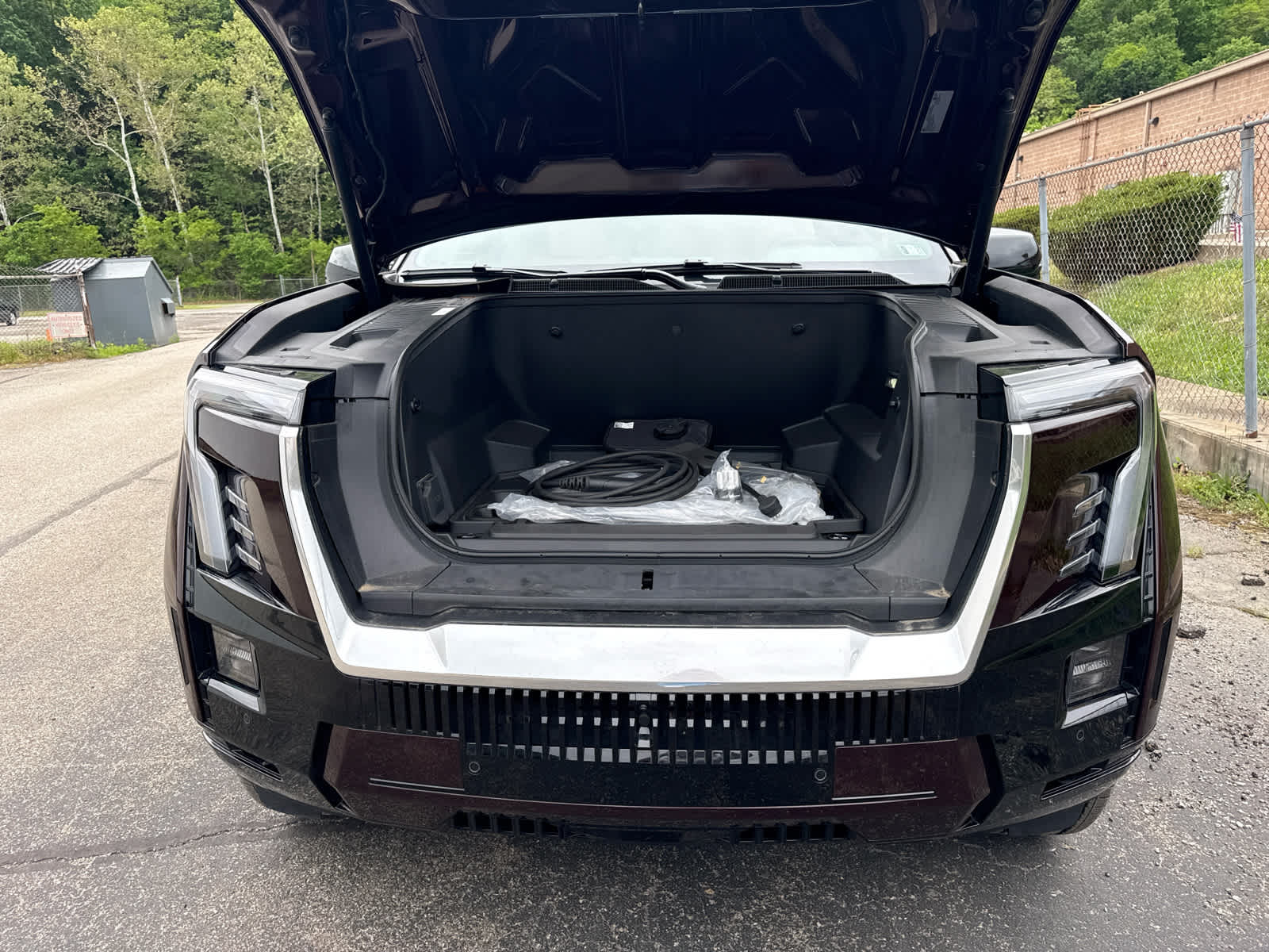 2025 GMC Sierra EV Extended Range Denali Dark Ember Tintcoat at Baglier Buick GMC Mazda