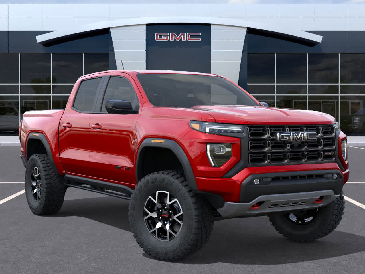 2026 GMC Canyon 4WD AT4X Volcanic Red Tintcoat at Rick Weaver GMC