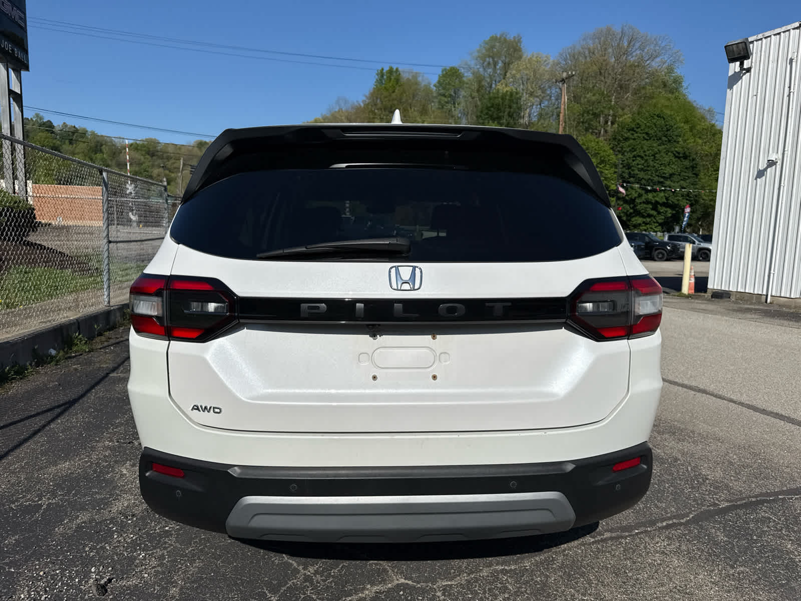 2023 Honda Pilot EX-L 8 Passenger Platinum White Pearl at Altoona Honda