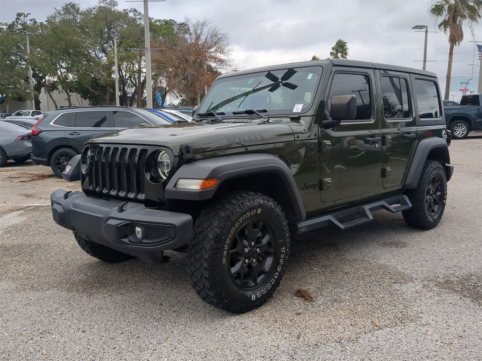 Used 2021 Jeep Wrangler Unlimited Willys with VIN 1C4HJXDNXMW621019 for sale in Tampa, FL