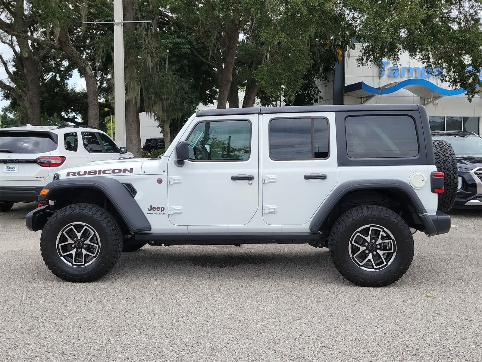 Used 2024 Jeep Wrangler 4-Door Rubicon with VIN 1C4PJXFG2RW243778 for sale in Tampa, FL