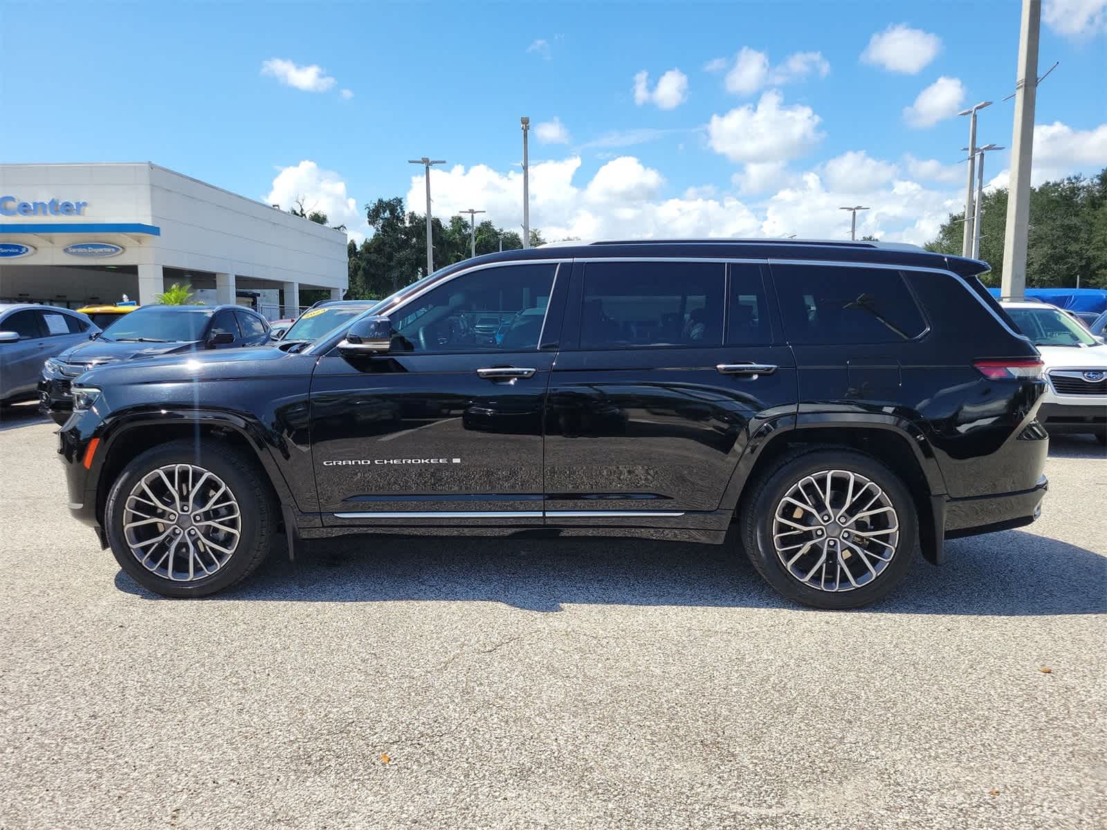 Used 2023 Jeep Grand Cherokee L Summit Reserve with VIN 1C4RJKEG8P8860746 for sale in Tampa, FL