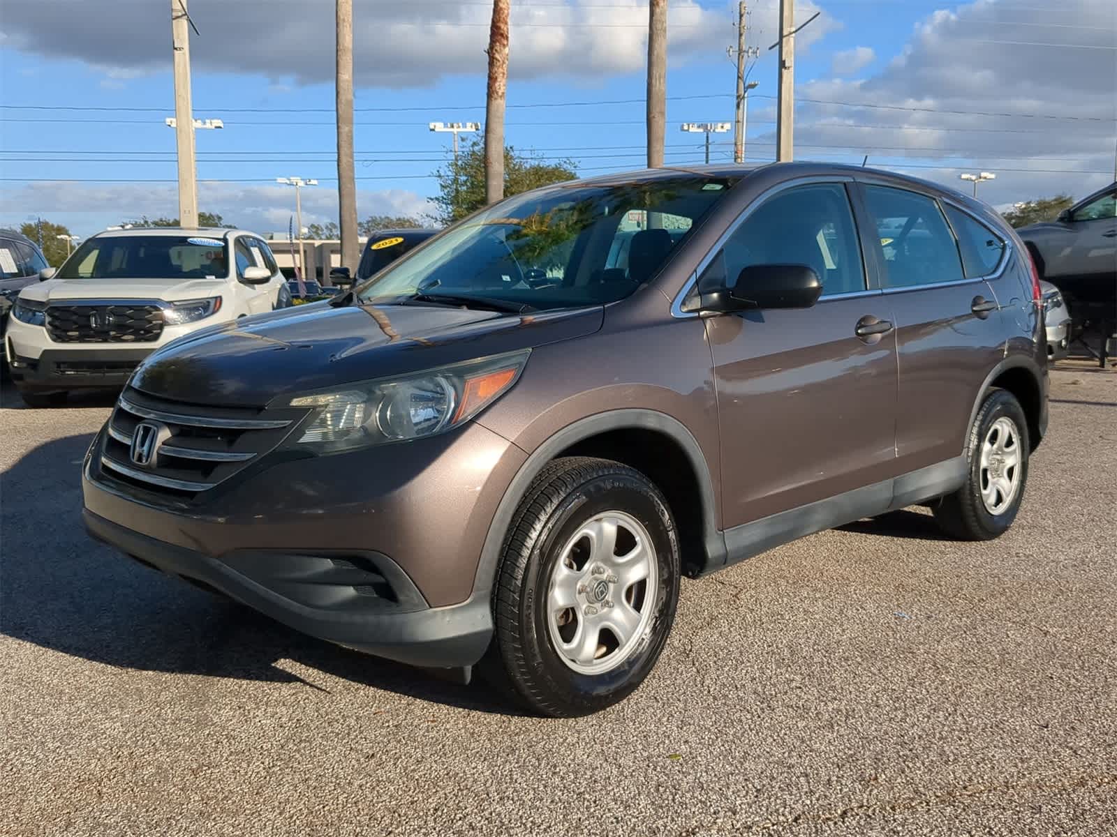 Used 2014 Honda CR-V LX with VIN 2HKRM3H30EH566519 for sale in Tampa, FL