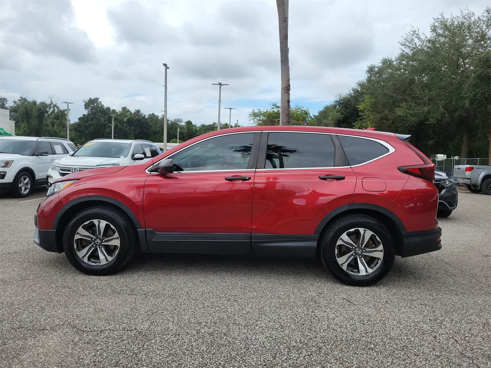 Used 2020 Honda CR-V LX with VIN 2HKRW1H25LH405506 for sale in Tampa, FL